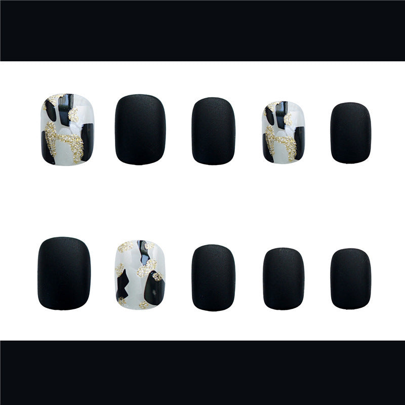 Wearing Black Frosted Shell Fake Nails – Elegant Matte Press-On Nails